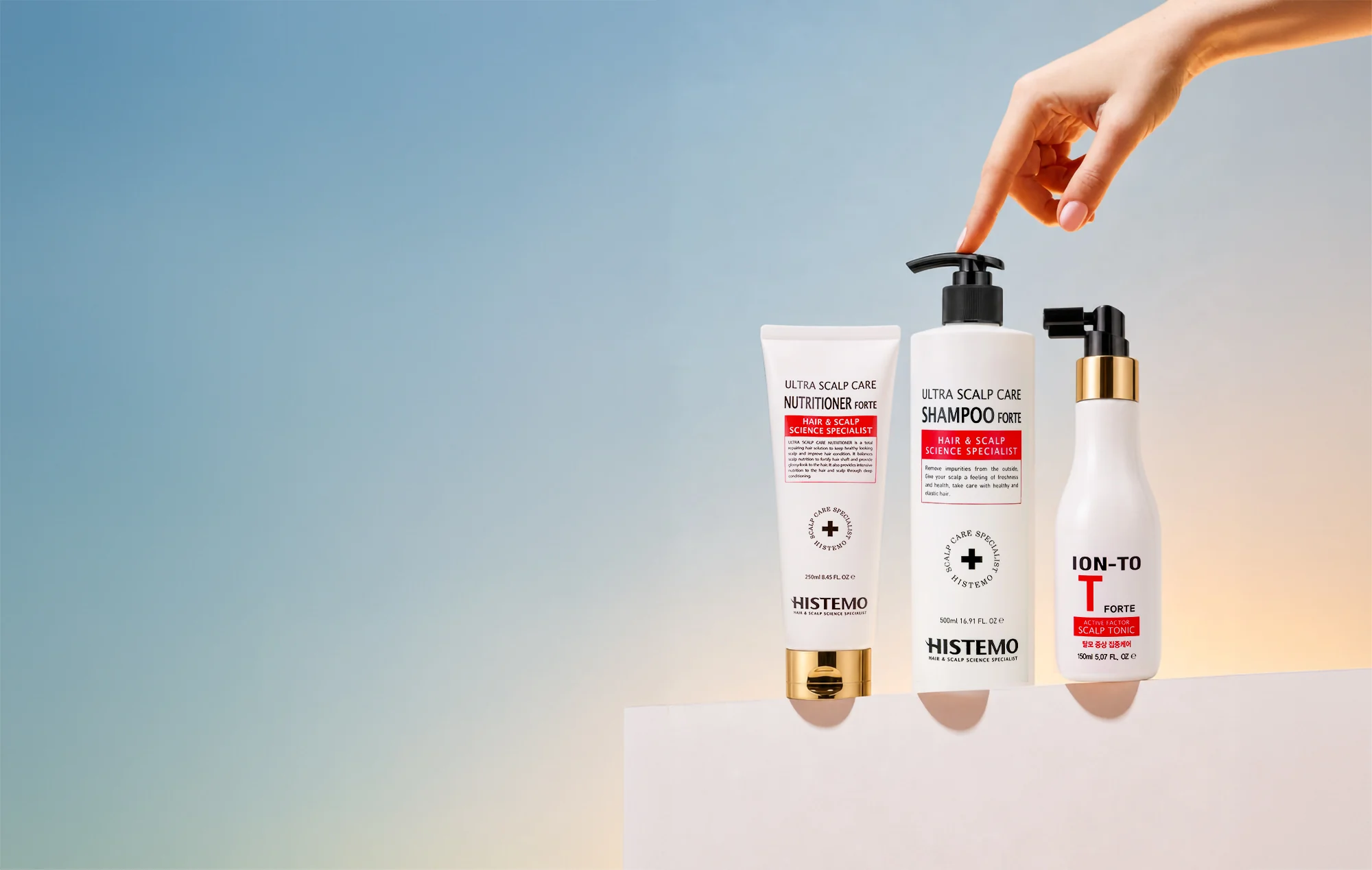 Histemo Nutritioner, Shampoo and ION-TO T Forte Scalp Tonic on a ledge against a blue sky
